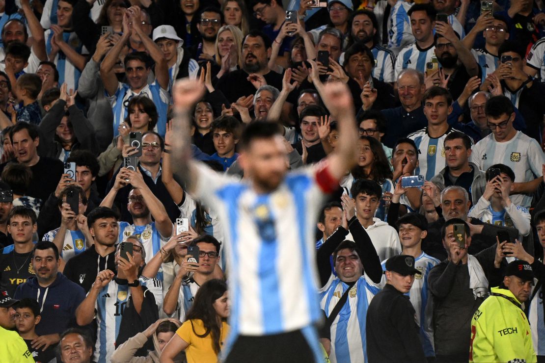 Messi celebrates in front of his enthusiastic fans at the Estadio Monumental in Buenos Aires.