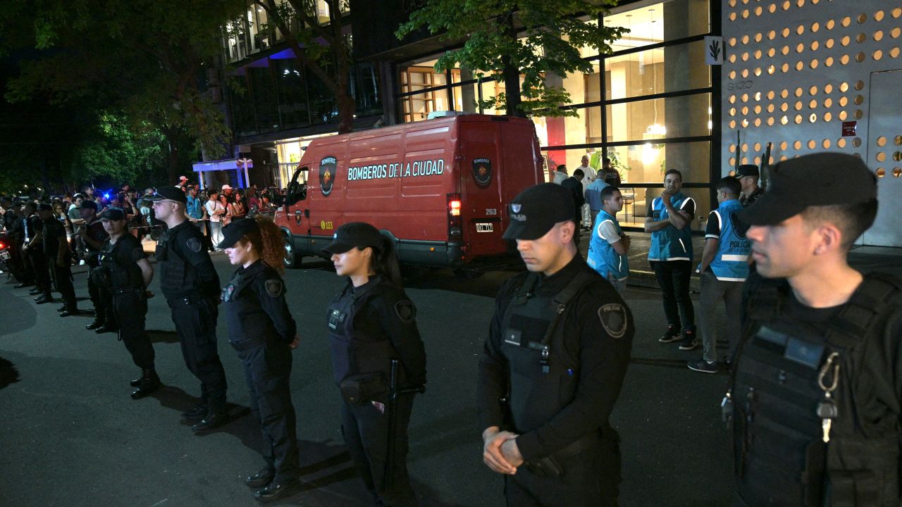 Police officers stand guard at the entrance of the hotel where Liam Payne died in Buenos Aires on October 16.