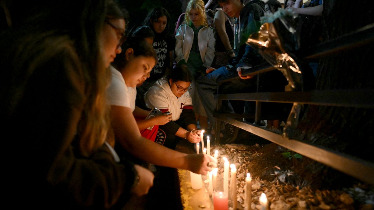 Fans of British singer Liam Payne light candles outside the hotel where he died in Buenos Aires, Argentina, on October 16.