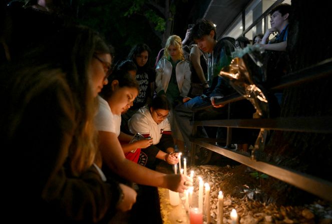 Fans of Payne light candles outside the hotel where he died in Buenos Aires on October 16, 2024.