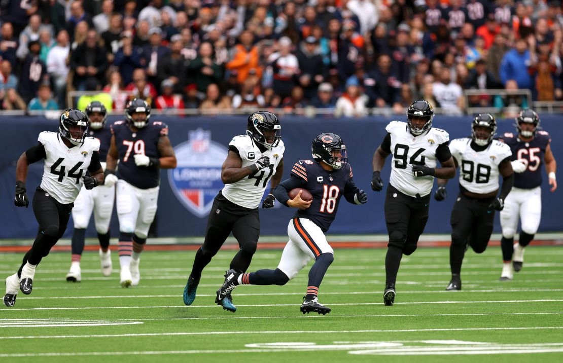 Williams scrambles with the ball during the game.