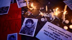 BUENOS AIRES, ARGENTINA - OCTOBER 17: A portrait of Liam Payne is seen next to candles as fans gather at the Obelisk on October 17, 2024 in Buenos Aires, Argentina. According to the Buenos Aires police department, Payne fell from a third-floor hotel room balcony in Palermo, a famous neighborhood in Buenos Aires. Fans around the city gather to pay tribute to the former member of boy band One Direction. (Photo by Marcos Brindicci/Getty Images)