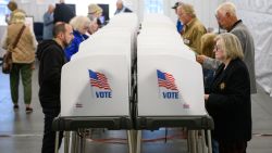 HENDERSONVILLE, NORTH CAROLINA - OCTOBER 17:  Voters make selections at their voting booths inside an early voting site on October 17, 2024 in Hendersonville, North Carolina. Several counties effected by Hurricane Helene saw a large turnout of residents for the first day of early voting in Western North Carolina. (Photo by Melissa Sue Gerrits/Getty Images)