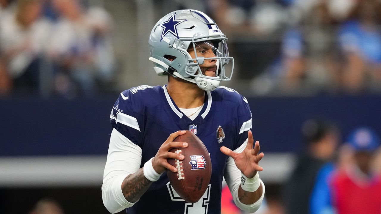 ARLINGTON, TEXAS - OCTOBER 13: Dak Prescott #4 of the Dallas Cowboys looks to throw a pass in the second quarter of a game against the Detroit Lions at AT&T Stadium on October 13, 2024 in Arlington, Texas. (Photo by Sam Hodde/Getty Images)