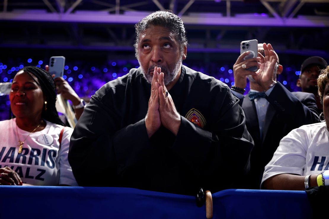 The Rev. William J. Barber II listens to Harris speak at a campaign rally in Greenville, North Carolina, on October 13, 2024.