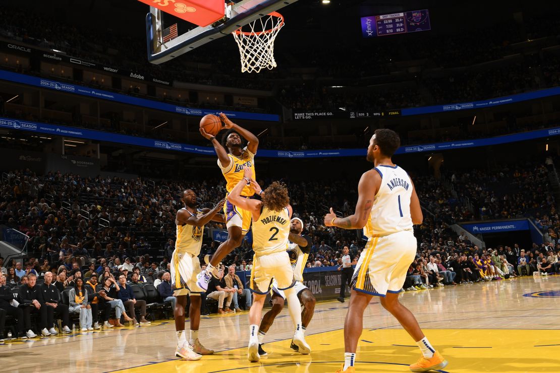 SAN FRANCISCO, CA - OCTOBER 18: Bronny James #9 of the Los Angeles Lakers drives to the basket during the game against the Golden State Warriors during an NBA Preseason game on October 18, 2024 at Chase Center in San Francisco, California. NOTE TO USER: User expressly acknowledges and agrees that by downloading and/or using this photo, user agrees to the terms and conditions of the Getty Images License Agreement. Mandatory Copyright Notice: Copyright 2024 NBAE (Photo by Noah Graham/NBAE via Getty Images)