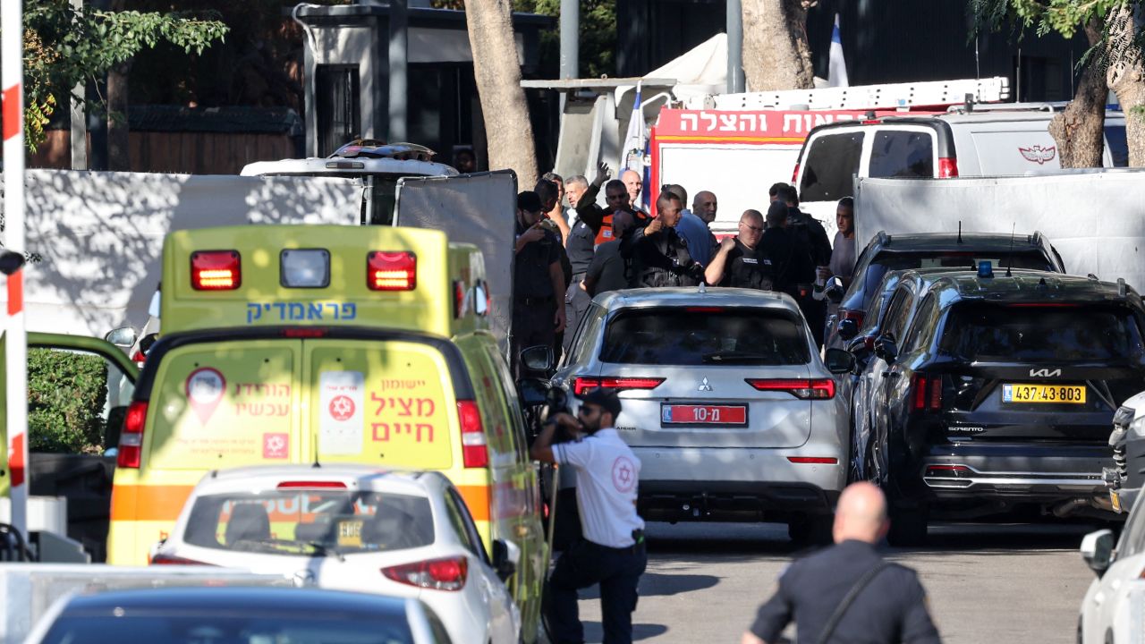 An ambulance can be seen as security forces wallow a car to cross a barrier along a street leading to Prime Minister Benjamin Netanyahu's residence in Caesarea on October 19, 2024. Netanyahu's office said a drone was launched toward his residence on October 19, after the military reported a drone from Lebanon had "hit a structure" in the central Israeli town. (Photo by Jack GUEZ / AFP) (Photo by JACK GUEZ/AFP via Getty Images)