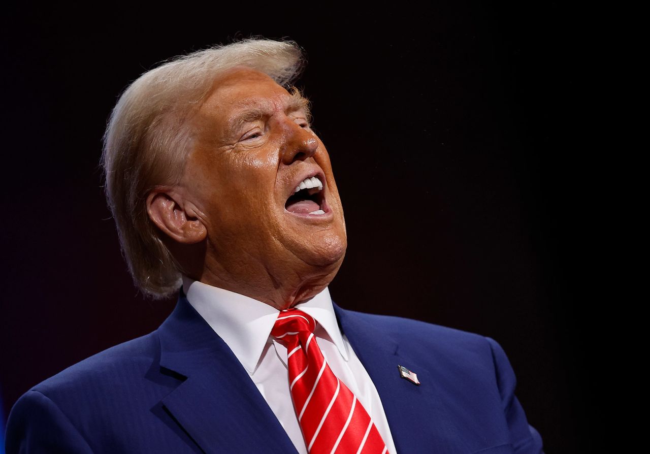 Republican presidential nominee, former President Donald Trump delivers remarks during a campaign rally in Atlanta, Georgia, on October 15, 2024.