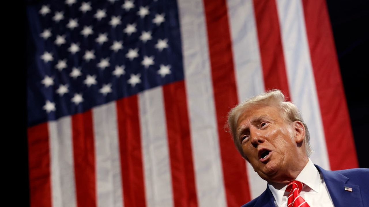 ATLANTA, GEORGIA - OCTOBER 15: Republican presidential nominee, former U.S. President Donald Trump delivers remarks during a campaign rally at the Cobb Energy Performing Arts Centre on October 15, 2024 in Atlanta, Georgia. With early voting starting today in Georgia both Trump and Democratic presidential nominee, Vice President Kamala Harris are campaigning in the Atlanta region this week as polls show a tight race.  (Photo by Kevin Dietsch/Getty Images)