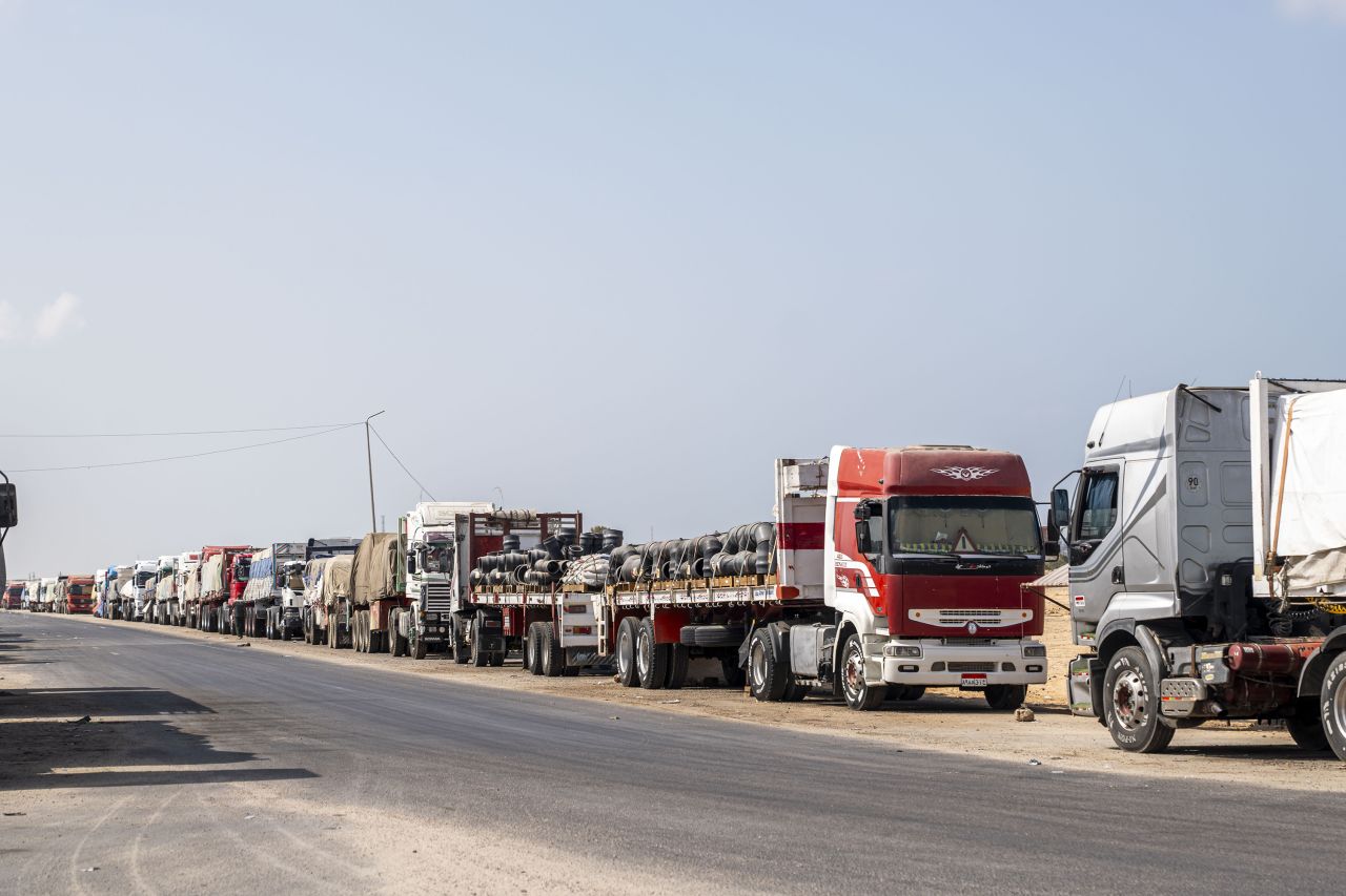 ARISH, EGYPT - OCTOBER 16: Trucks carrying relief supplies for the Gaza Strip are parked on the side of the road on October 16, 2024 in Arish, Egypt. A British delegation visited Al-Arish hospital, where injured Palestinians are being treated, as well as a warehouse where humanitarian aid has been stored since the Rafah border crossing into Gaza was closed in May. (Photo by Ali Moustafa/Getty Images)