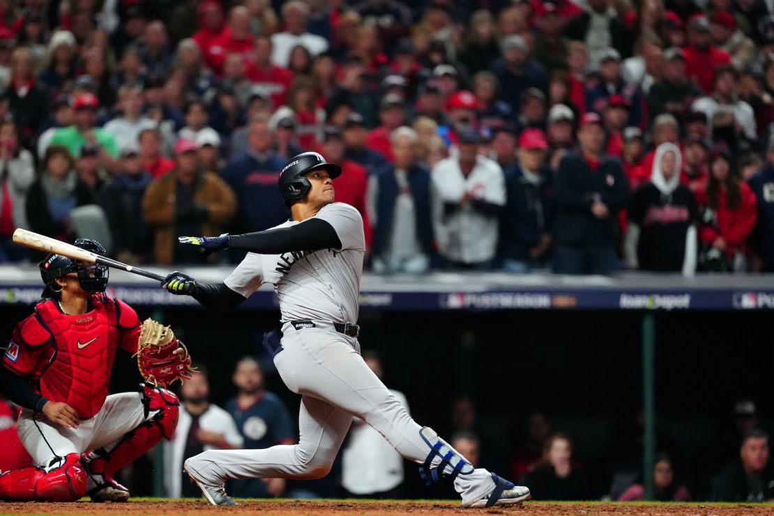 CLEVELAND, OH - OCTOBER 19: Juan Soto #22 of the New York Yankees hits a three-run home run in the 10th inning during Game 5 of the ALCS