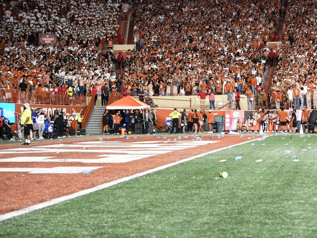 Fans threw trash onto the field during the game.