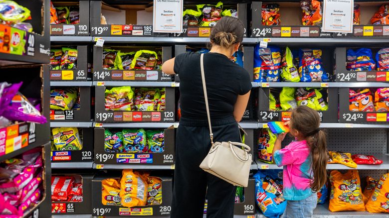A family shops for Halloween candy at a Walmart Supercenter on October 16, 2024 in Austin, Texas.
