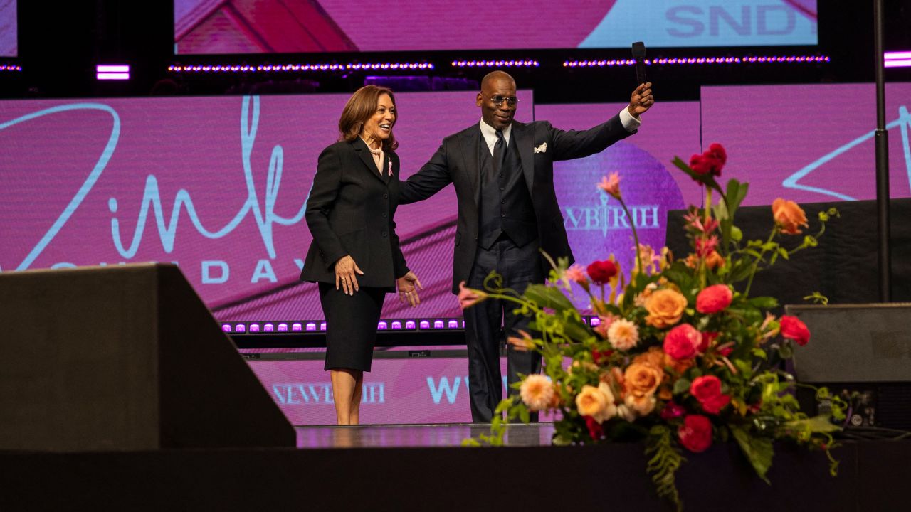 Pastor Jamal Bryant introduces US Vice President and Democratic presidential candidate Kamala Harris during a church service at New Birth Missionary Baptist Church in Stonecrest, Georgia, on October 20.