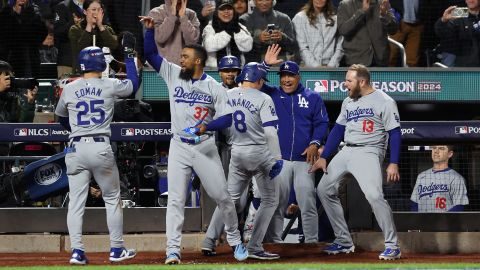 Enrique Hernández of the Los Angeles Dodgers celebrates with teammates after hitting a home run in the sixth inning against the New York Mets during Game Three of the National League Championship Series at Citi Field in New York, on October 16, 2024