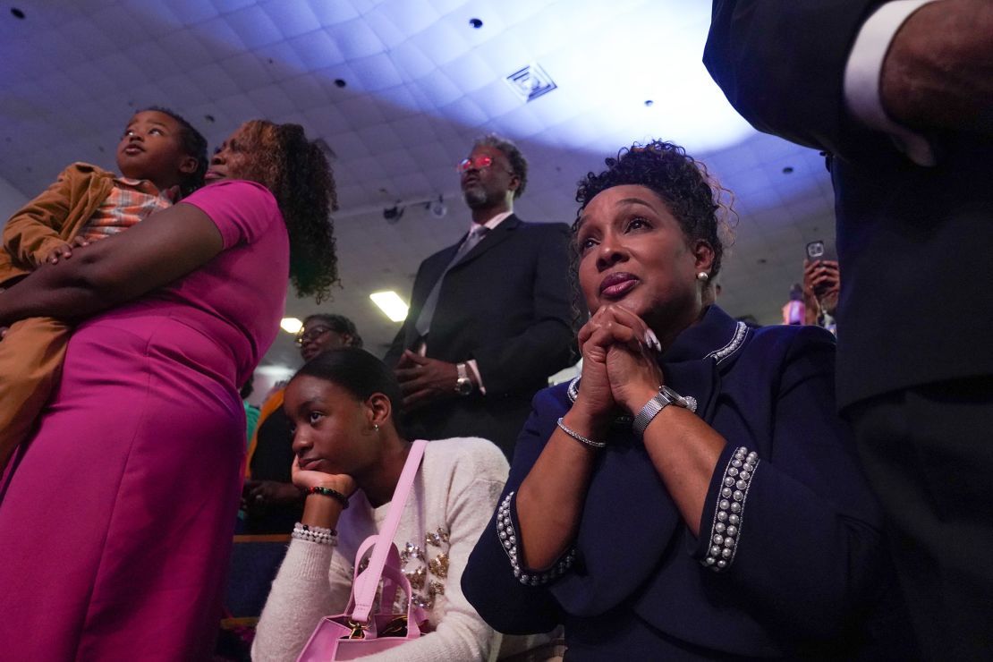 Harris supporters listen as she speaks at a campaign event in Jonesboro, Georgia, on October 20, 2024.