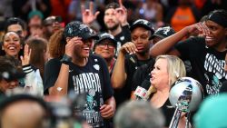 Nyara Sabally #8 of the New York LIberty is interviewed by Holly Rowe after defeating the Minnesota Lynx during Game Five of the 2024 WNBA Finals on October 20, 2024 in Brooklyn, New York.