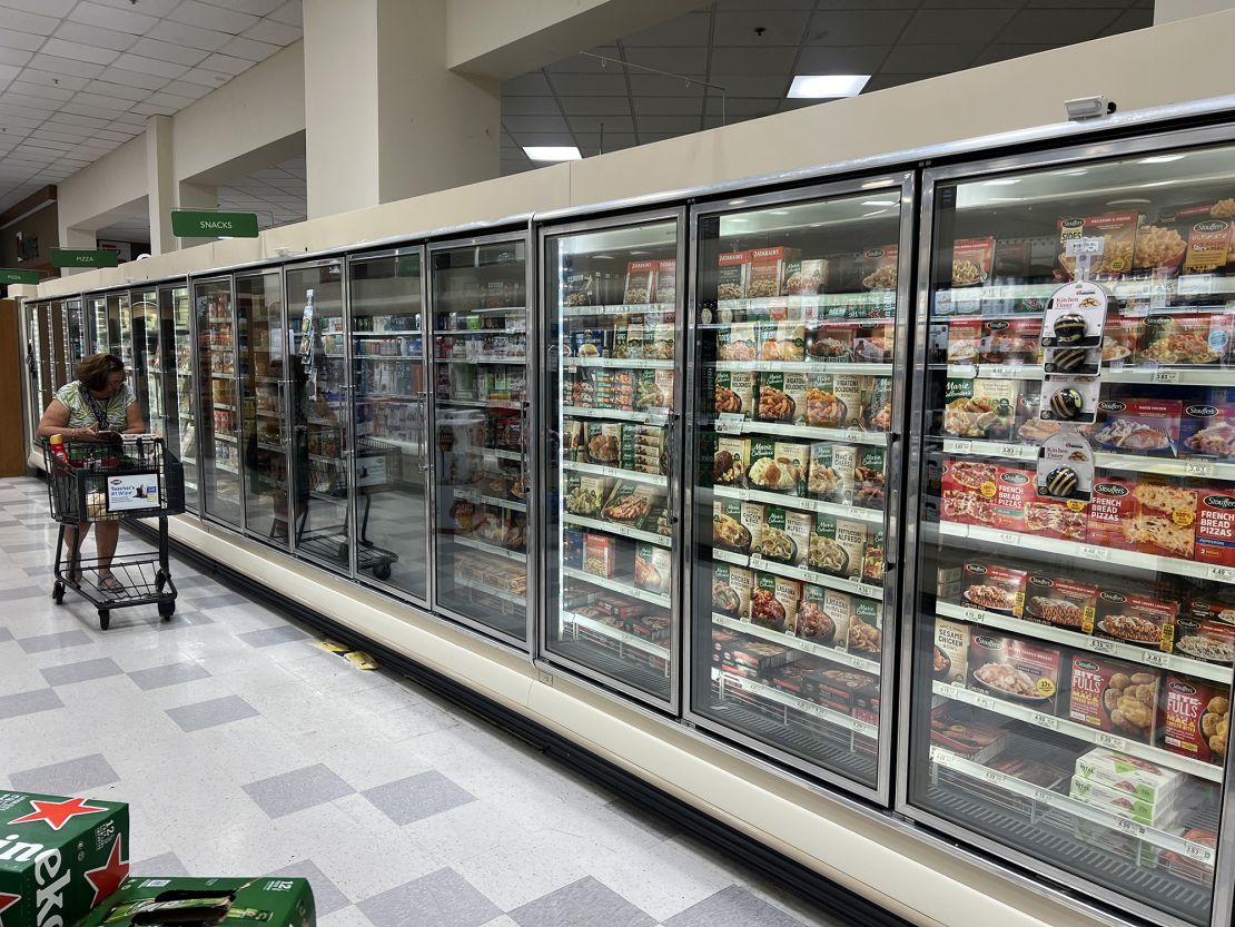 A customer shops in the frozen foods aisle of a grocery store in Miami on October 17, 2024.