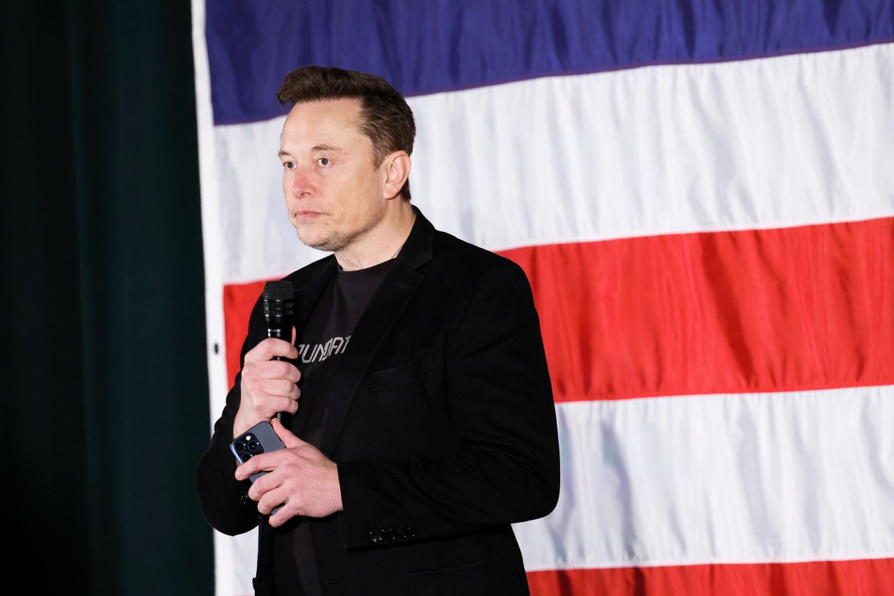 Elon Musk participates in a town hall-style meeting to promote early and absentee voting at Ridley High School on October 17 in Folsom, Pennsylvania.