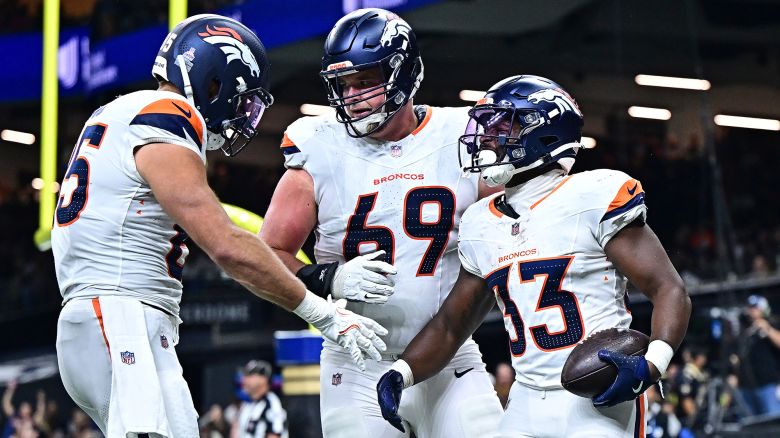 Javonte Williams (No. 33) scored two touchdowns as Denver Broncos beat the New Orleans Saints.