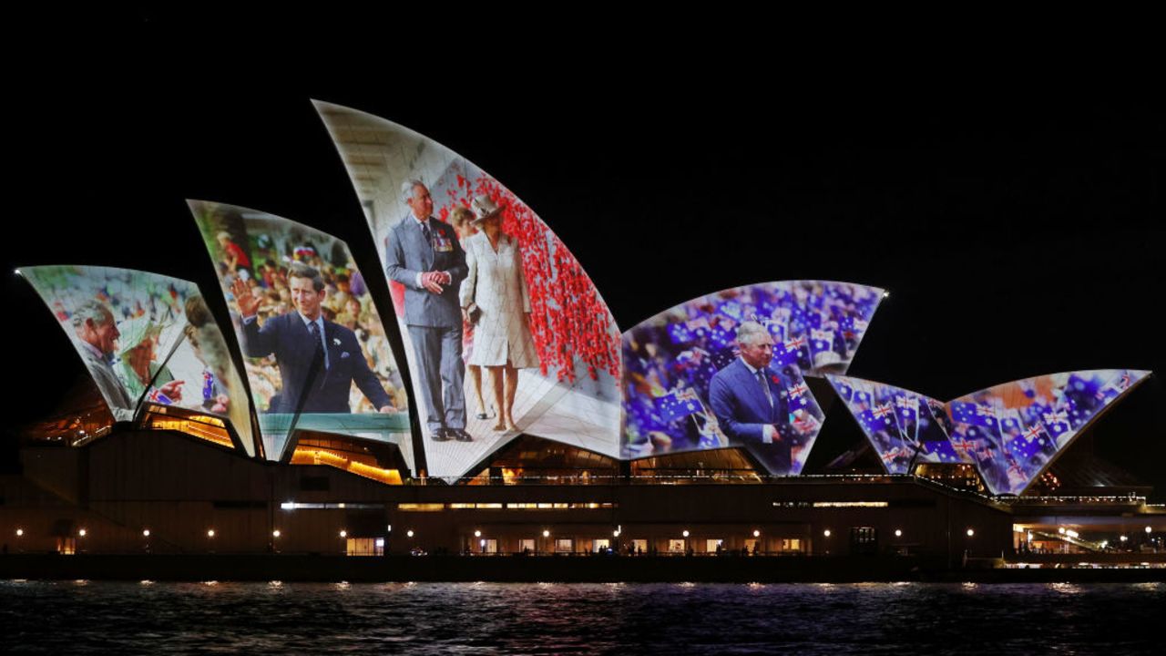 SYDNEY, AUSTRALIA - OCTOBER 18: The Sydney Opera House shells are illuminated with a Royal projection to officially welcome King Charles III and Queen Camilla on October 18, 2024 in Sydney, Australia. The King's visit to Australia will be his first as Monarch, and CHOGM in Samoa will be his first as Head of the Commonwealth. (Photo by Lisa Maree Williams/Getty Images)