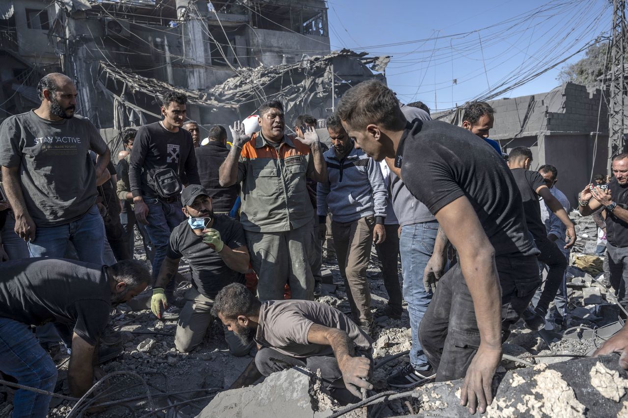 Search and rescue operations continue in the area after an Israeli airstrike during the night around the Rafik Hariri State Hospital in Beirut, Lebanon, on October 22.