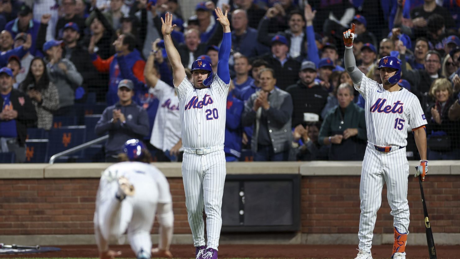 Pete Alonso and Tyrone Taylor celebrate as the New York Mets defeat the Los Angeles Dodgers 12-6 in Game 5 of the NLCS.