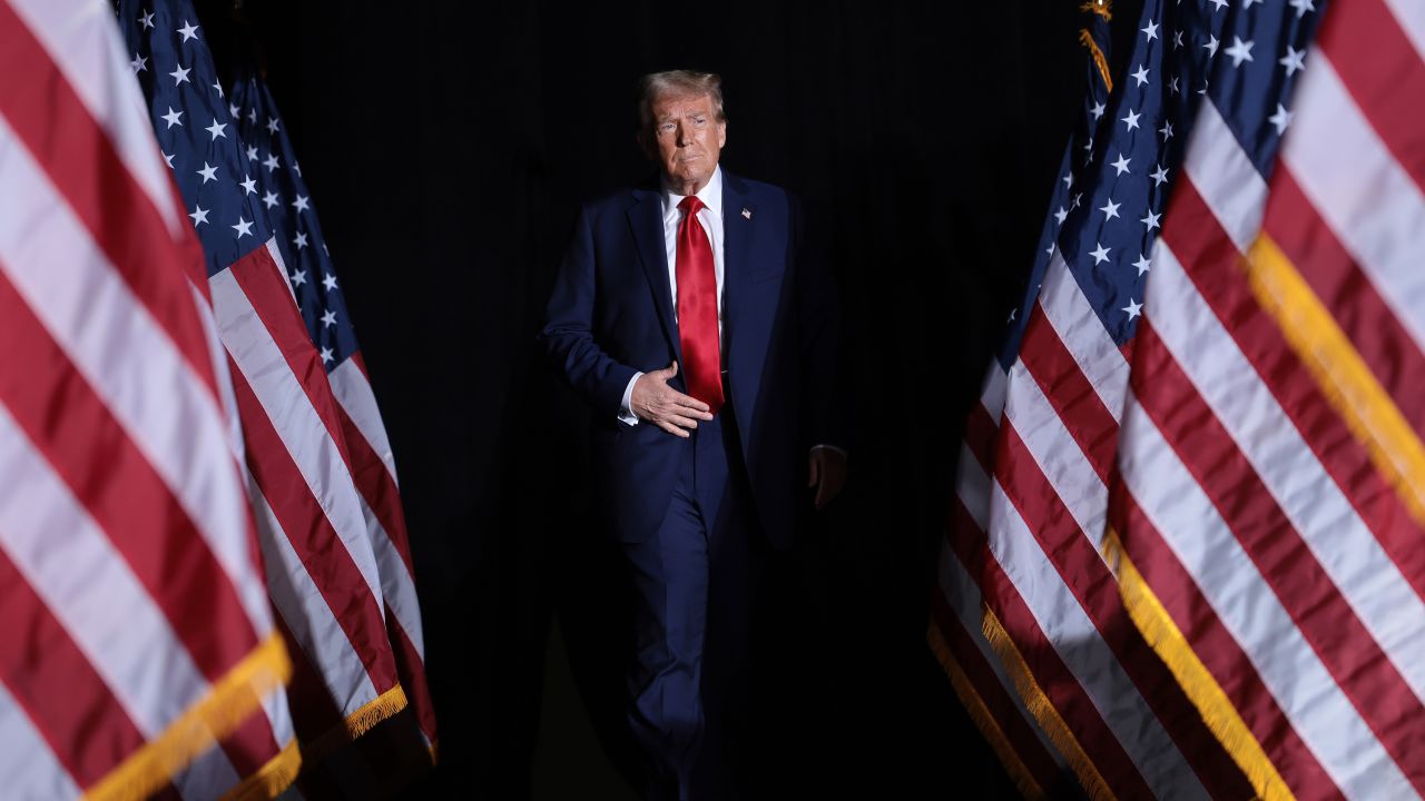 DETROIT, MICHIGAN - OCTOBER 18: Republican presidential nominee, former U.S. President Donald Trump, arrives on stage at a campaign rally on October 18, 2024, in Detroit, Michigan. There are 17 days remaining until the U.S. presidential election, which will take place on Tuesday, November 5, 2024. (Photo by Win McNamee/Getty Images)