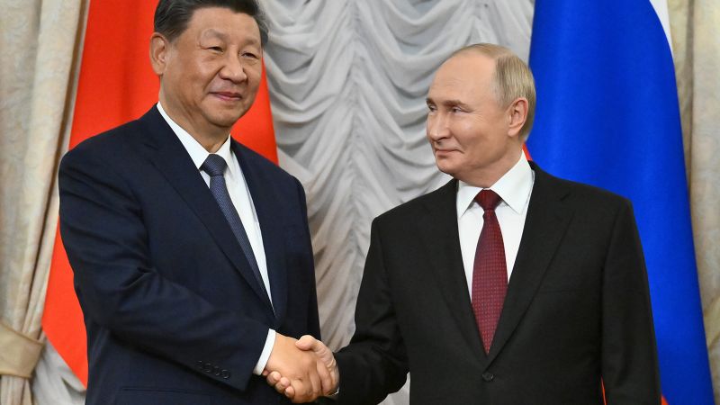 Xi and Putin hail tightening ties in call hours after Trump inauguration