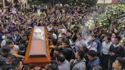 Catholic faithful attend a mass to say goodbye to murdered Catholic priest Marcelo Perez before his funeral in San Andres Larrainzar, Chiapas State, Mexico, on October 22, 2024. Priest Marcelo Perez, a well-known human rights defender who denounced violence linked to drug trafficking in Mexico, was shot dead on October 20 in San Cristobal de las Casas. (Photo by Luis Enrique AGUILAR / AFP) (Photo by LUIS ENRIQUE AGUILAR/AFP via Getty Images)