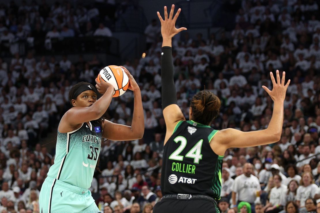 MINNEAPOLIS, MINNESOTA - OCTOBER 18: Jonquel Jones #35 of the New York Liberty shoots the ball against Napheesa Collier #24 of the Minnesota Lynx during the third quarter in Game Four of the WNBA Finals at Target Center on October 18, 2024 in Minneapolis, Minnesota. (Photo by David Berding/Getty Images)