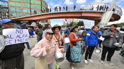 Housewives take part in a "march of empty pots" against the rising prices of the family basket and to demand economic stability from the government of Bolivian President Luis Arce in El Alto, Bolivia, on October 22, 2024. (Photo by AIZAR RALDES / AFP) (Photo by AIZAR RALDES/AFP via Getty Images)