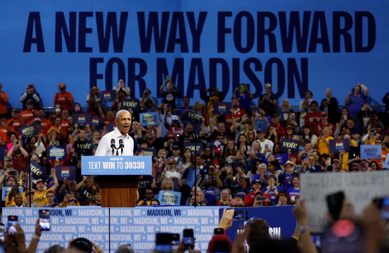 Former US President Barack Obama speaks at a campaign rally with Minnesota Governor and Democratic vice presidential candidate Tim Walz in support of Kamala Harris in Madison, Wisconsin, on October 22.