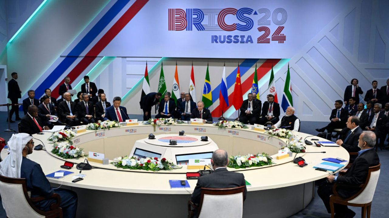 The United Arab Emirates' President Sheikh Mohamed bin Zayed Al Nahyan, South African President Cyril Ramaphosa, Chinese President Xi Jinping, Russia's President Vladimir Putin, Indian Prime Minister Narendra Modi, Egyptian President Abdel Fattah al-Sisi, Iran's President Masoud Pezeshkian and Brazilian Foreign Minister Mauro Vieira attend the narrow format meeting of the BRICS summit in Kazan on October 23, 2024. (Photo by Alexander NEMENOV / POOL / AFP) (Photo by ALEXANDER NEMENOV/POOL/AFP via Getty Images)