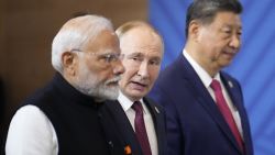 Indian Prime Minister Narendra Modi, Russian President Vladimir Putin and Chinese President Xi Jinping attend a family photo during the BRICS summit in Kazan on October 23, 2024. (Photo by Alexander Zemlianichenko / POOL / AFP) (Photo by ALEXANDER ZEMLIANICHENKO/POOL/AFP via Getty Images)