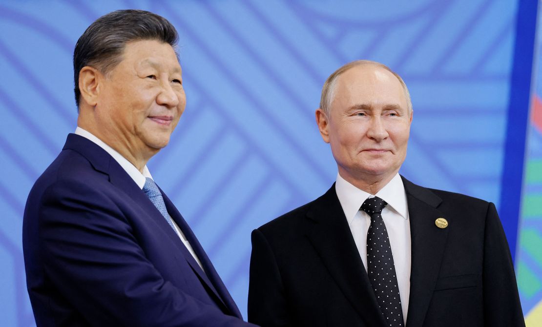 Russian President Vladimir Putin greets Chinese leader Xi Jinping at a summit of BRICS countries in Kazan, Russia on October 23, 2024.