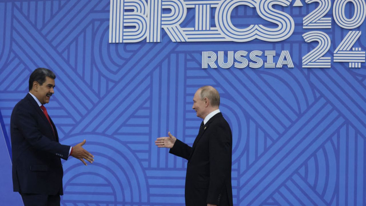 Russian President Vladimir Putin greets Venezuelan President Nicolas Maduro during an official welcoming ceremony for delegations' heads at the BRICS summit in Kazan on October 23, 2024. (Photo by MAXIM SHIPENKOV / POOL / AFP) (Photo by MAXIM SHIPENKOV/POOL/AFP via Getty Images)