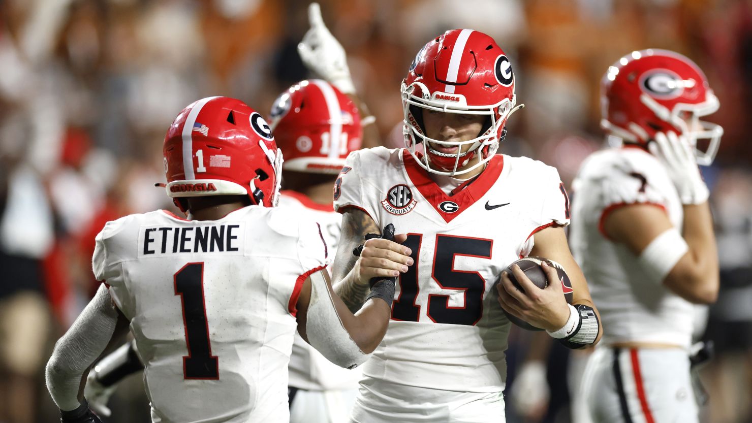 No. 5 Georgia upset No. 1 Texas in game marred by Longhorns fans throwing trash on the field