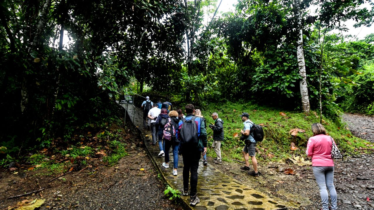 Tourists visit a Maleku village near the town of La Fortuna, about 170 km north of San Jose, on October 11, 2024. The Maleku are one of Costa Rica's eight native peoples, who together represent 2.4% of the country's 5.2 million inhabitants, according to official figures. This ethnic group has lived in this area for hundreds of years, but they are a minority group in the country, as it is estimated that there are no more than a thousand individuals. (Photo by Ezequiel BECERRA / AFP) (Photo by EZEQUIEL BECERRA/AFP via Getty Images)