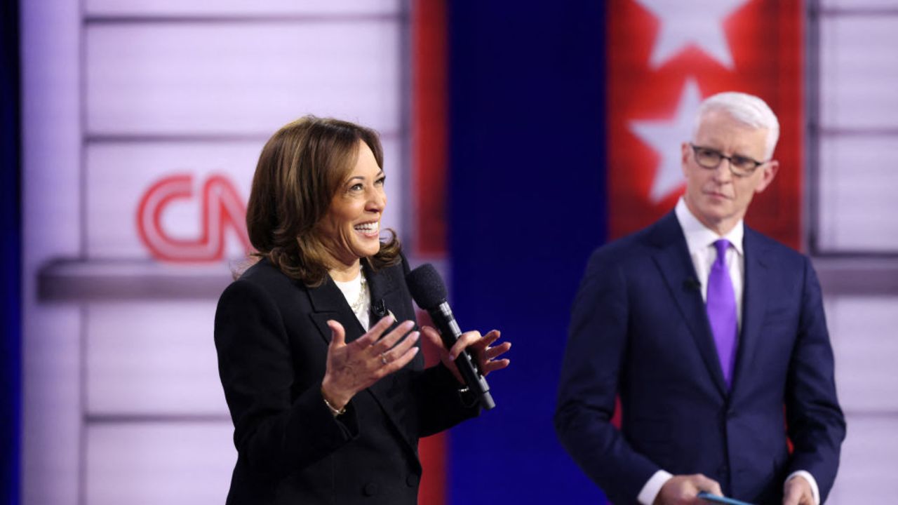 US Vice President and Democratic presidential candidate Kamala Harris speaks as she replies to a question from an attendee during a CNN Town Hall moderated by television host Anderson Cooper (R) at Sun Center studios in Aston, Pennsylvania, on October 23, 2024. (Photo by CHARLY TRIBALLEAU / AFP) (Photo by CHARLY TRIBALLEAU/AFP via Getty Images)