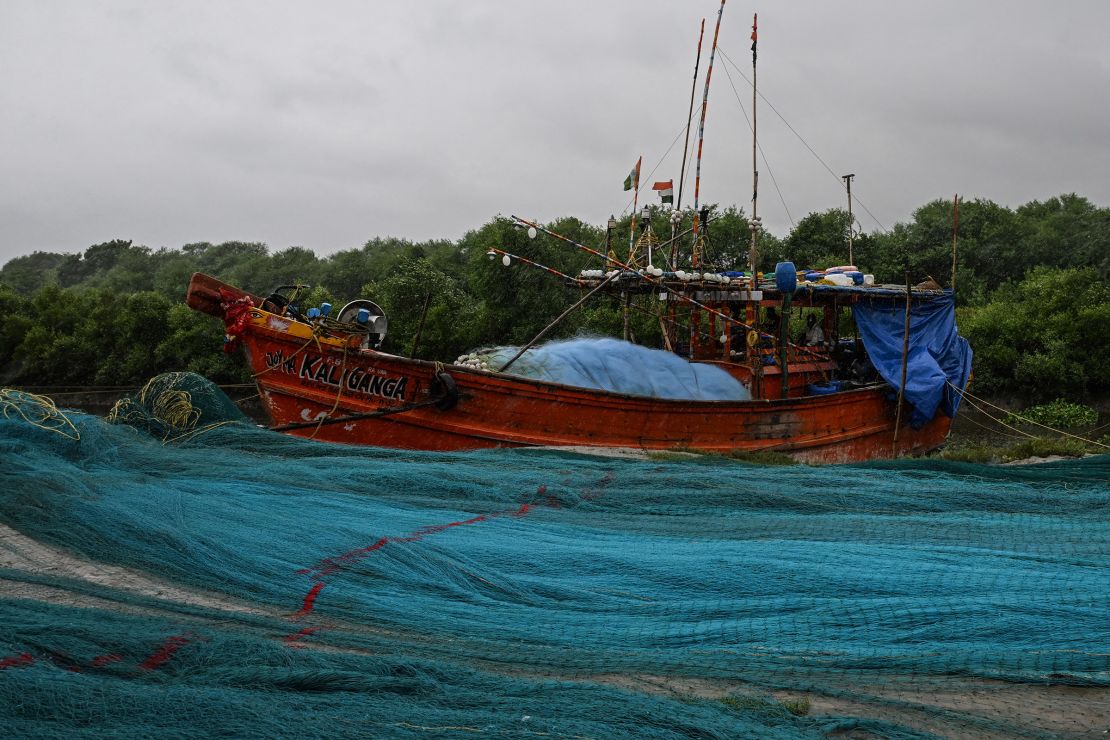 Fishing trawlers are seen parked at a beach near the Bay of Bengal in Digha, India, ahead of cyclone Dana's landfall, on October 24, 2024.