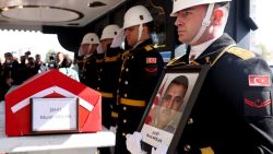 Military honour guards stand next to the coffin of taxi driver Murat Arslan during his funeral, the day after he was killed in a  bomb attack to the state-run Turkish Aerospace Industries (TAI) building,  in Ankara on October 24, 2024. The first Ankara attack victims were to be buried on October 24, hours after Turkey struck PKK militants in Iraq after blaming them for the assault on a defence firm that killed five and injured 22 others. Two attackers were killed in the assault, with new CCTV images from the site posted on X distinctly showing two young people, a woman and a man, getting out of a taxi, assault rifles in hand, and opening fire before entering the building. The taxi driver Murat Arslan was killed by the pair who stole his taxi, officials said. (Photo by Adem ALTAN / AFP) (Photo by ADEM ALTAN/AFP via Getty Images)