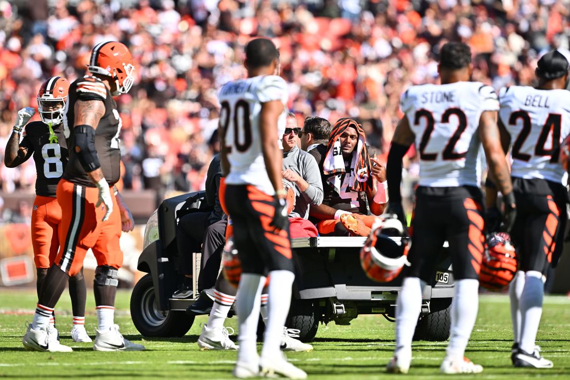 An emotional Watson was carted off the field Sunday.