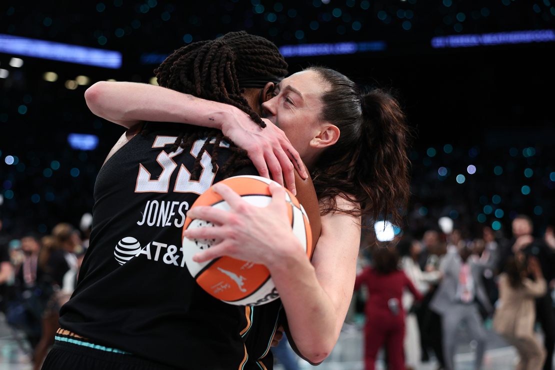 The Liberty's Breanna Stewart hugs teammate Jonquel Jones after New York won Game Five of the WNBA Finals.