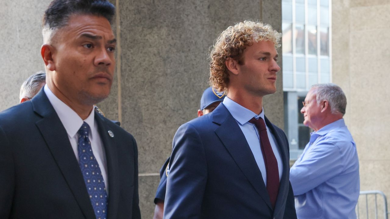 NEW YORK, NEW YORK - OCTOBER 21: Daniel Penny (R), who is charged in the death of Jordan Neely, walks into the courthouse as jury selection begins in his trial on October 21, 2024 in New York City. Penny, 26, a former Marine, is charged in the death of Jordan Neely on a New York City subway by choking him after an altercation involving panhandling on the train car. (Photo by Spencer Platt/Getty Images)