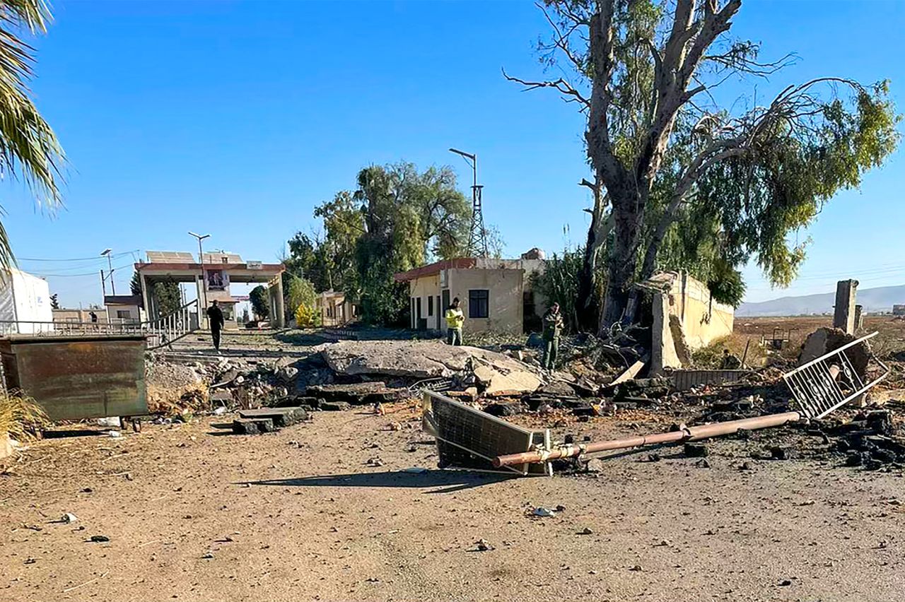 A photo taken from the Syrian side of the border with Lebanon shows the aftermath of an Israeli strike on the Jusiyeh border crossing in Syria's central Homs province on October 25.