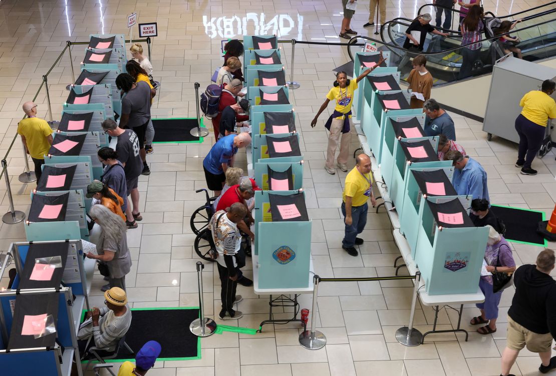 People vote at a polling station in Las Vegas on October 21, 2024.