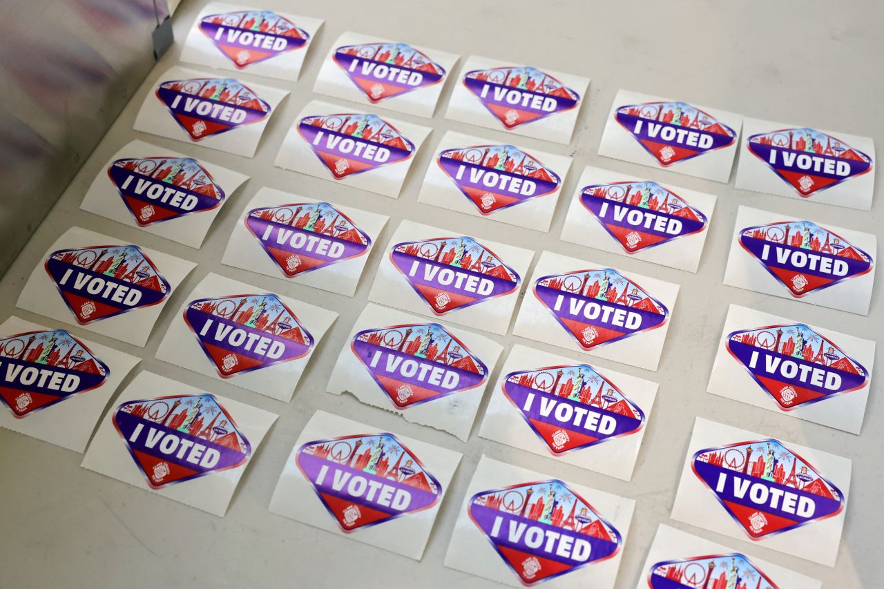 Las Vegas Strip-themed "I Voted" stickers are placed on a table where voters turn in mail-in ballots at the Meadows Mall on October 21, 2024, in Las Vegas, Nevada. (Photo by Ethan Miller/Getty Images)