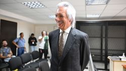 Guatemalan journalist Jose Ruben Zamora (L), founder of the defunct El Periódico newspaper, smiles as he takes a break during his hearing at the Palace of Justice in Guatemala City on October 25, 2024. A Guatemalan court on October 18 granted house arrest to journalist José Rubén Zamora, imprisoned since July 2022 for cases brought by the Central American country's questioned prosecutor's office. (Photo by JOHAN ORDONEZ / AFP) (Photo by JOHAN ORDONEZ/AFP via Getty Images)