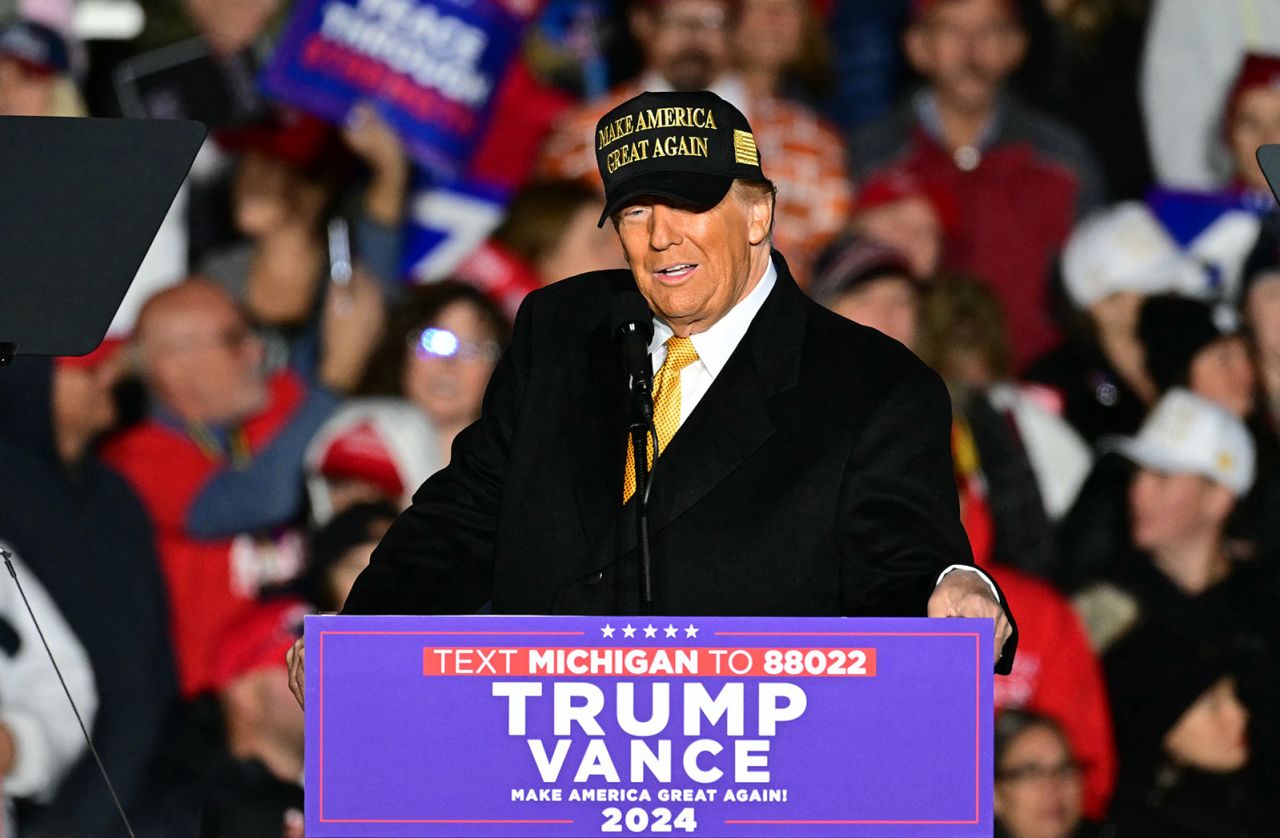 Former President Republican presidential candidate Donald Trump speaks during a campaign rally in Traverse City, Michigan on October 25, 2024.